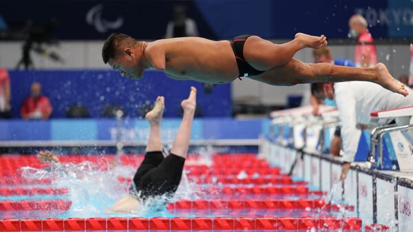 Плавание. Мужчины, 50 м вольным стилем. Чаркорн Кэусри из Таиланда. - Sputnik Беларусь