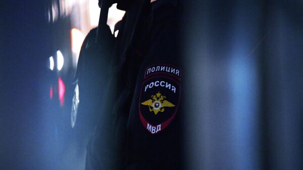 Эмблема на форме сотрудника полиции РФ - Sputnik Беларусь