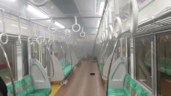 Место происшествия в токийском метро - Sputnik Беларусь