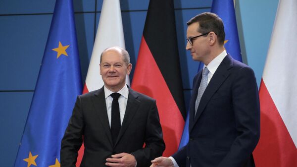 Канцлер Германии Шольц и премьер-министр Польши Моравецкий провели пресс-конференцию в Варшаве
 - Sputnik Беларусь