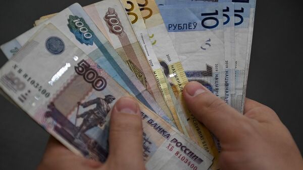 Белорусские и российские деньги - Sputnik Беларусь