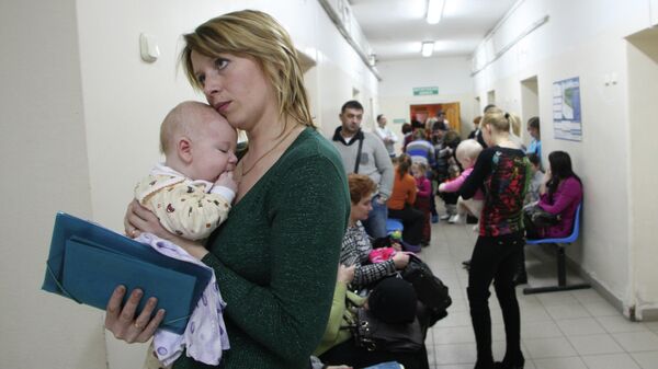 Женщина с ребенком в больнице - Sputnik Беларусь