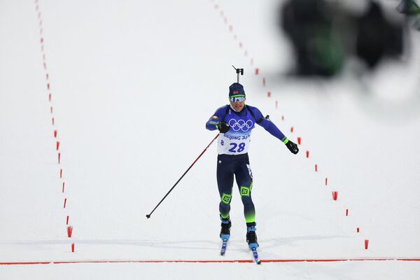 Антон Смольский финиширует в индивидуальной гонке на Олимпийских играх в Пекине - Sputnik Беларусь