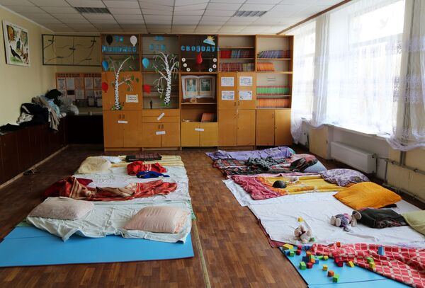 Пункт приема беженцев организовали в здании школы села Безыменное. - Sputnik Беларусь