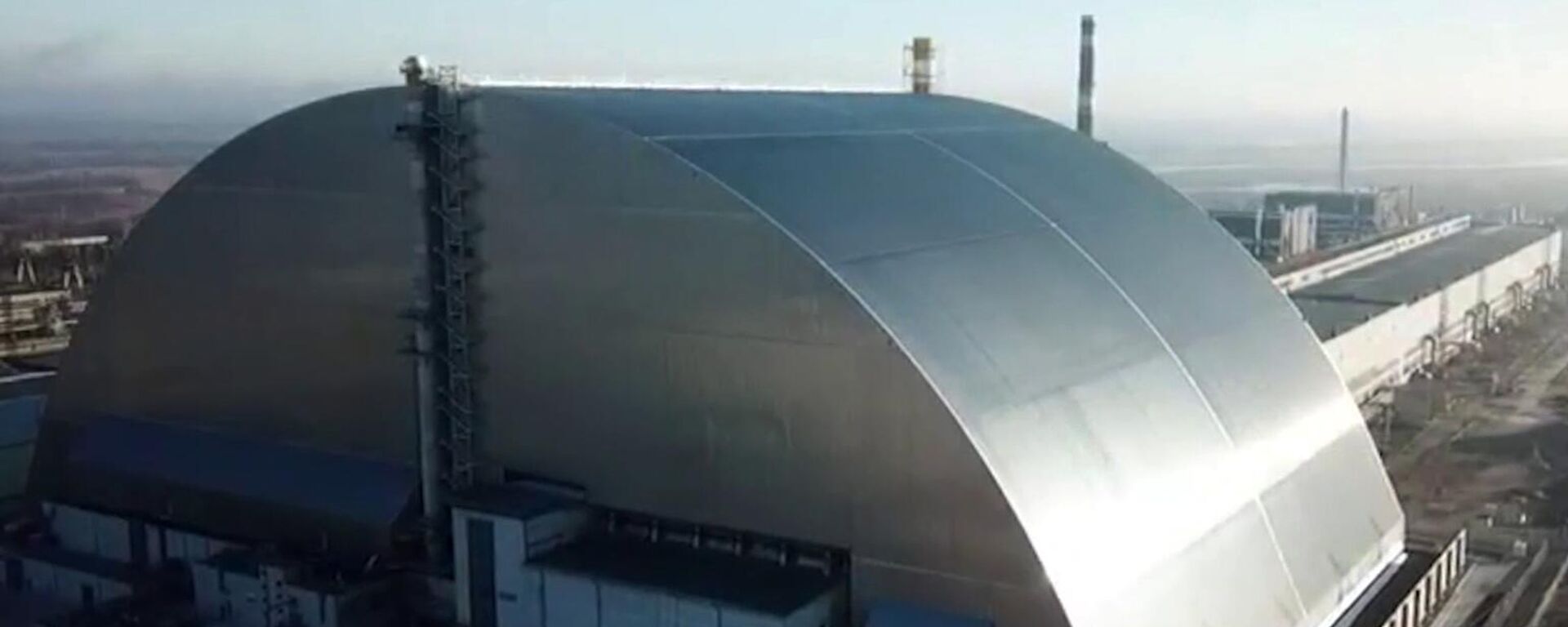 Вид на саркофаг четвертого энергоблока Чернобыльской АЭС - Sputnik Беларусь, 1920, 16.04.2026