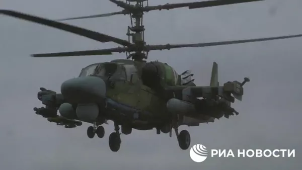Российские Ка-52 Аллигаторы уничтожили ангар с вооружением - Sputnik Беларусь