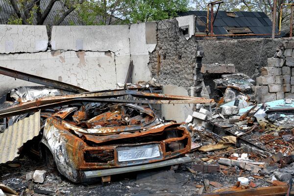 Сгоревший гараж с автомобилем в частном секторе города. - Sputnik Беларусь