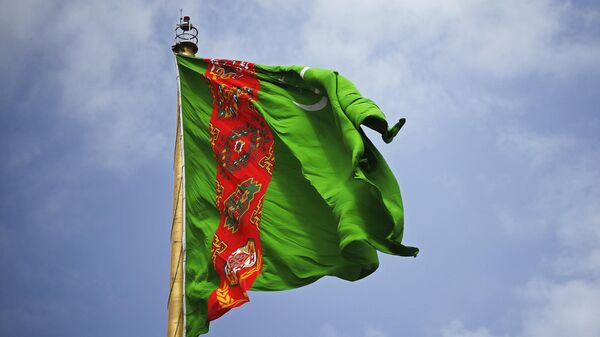 Государственный флаг Туркменистана в Ашхабаде - Sputnik Беларусь