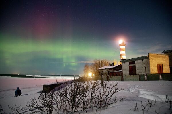 Северное сияние над прибрежным маяком в Финском заливе недалеко от Санкт-Петербурга. - Sputnik Беларусь