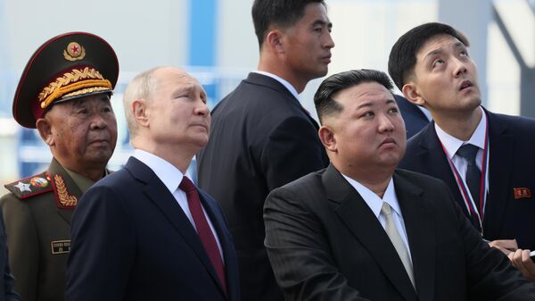О чем говорили Путин и Ким Чен Ын на космодроме Восточный ― видео - Sputnik Беларусь