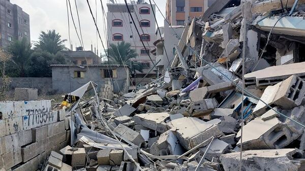 Обломки зданий, пострадавших в результате ракетных ударов ВС Израиля по Газе - Sputnik Беларусь