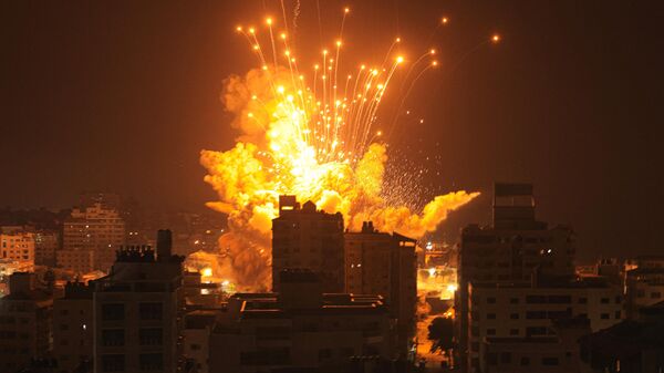 Обстрел зданий в палестинском городе Газа - Sputnik Беларусь