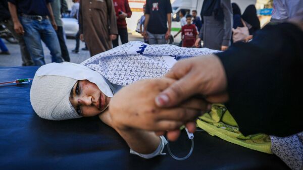Раненый ребенок в секторе Газа - Sputnik Беларусь