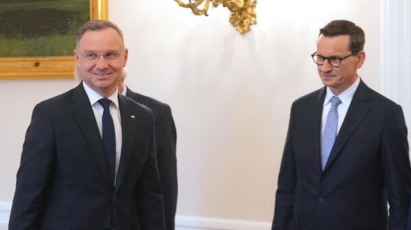 Президент Польши Анджей Дуда (слева) и Матеуш Моравецкий - Sputnik Беларусь