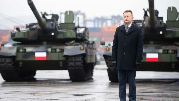 Министр обороны Польши Мариуш Блащак на приемке первых южнокорейских боевых танков К2 и южнокорейских гаубиц К9  - Sputnik Беларусь