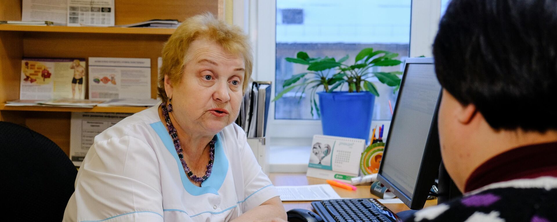 Жанчына на прыёме ва ўрача, архіўнае фота - Sputnik Беларусь, 1920, 26.04.2025