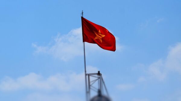 Флаг Демократической Республики Вьетнам в Хошимине - Sputnik Беларусь