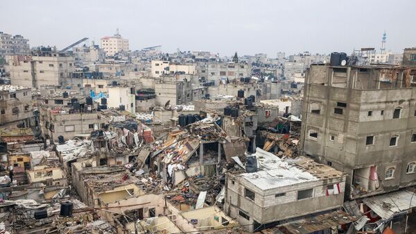 Разрушения после израильской бомбардировки Рафаха на юге сектора Газа 13 декабря 2023 года - Sputnik Беларусь
