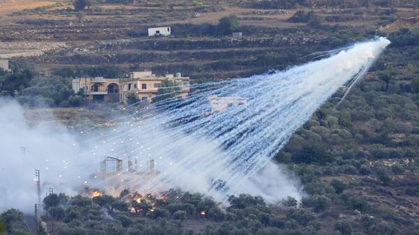 Снаряд израильской армии взрывается в ливанской приграничной деревне - Sputnik Беларусь