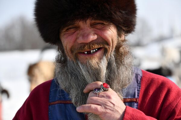 Участник народных гуляний во время празднования Масленицы в Суздале - Sputnik Беларусь