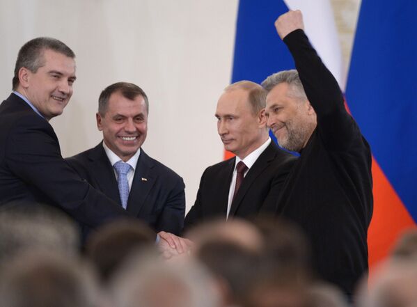 Президент РФ Владимир Путин в Кремле во время церемонии подписания договора между Российской Федерацией и Республикой Крым - Sputnik Беларусь