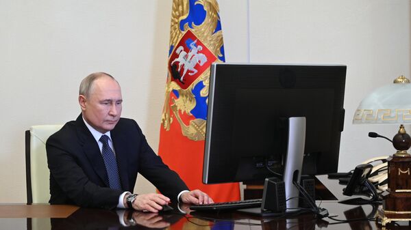 Владимир Путин проголосовал на  президенских выборах - Sputnik Беларусь