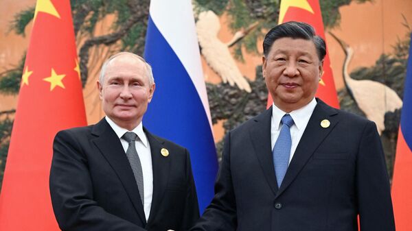 Президент России Владимир Путин и председатель КНР Си Цзиньпин во время встречи в Пекине - Sputnik Беларусь