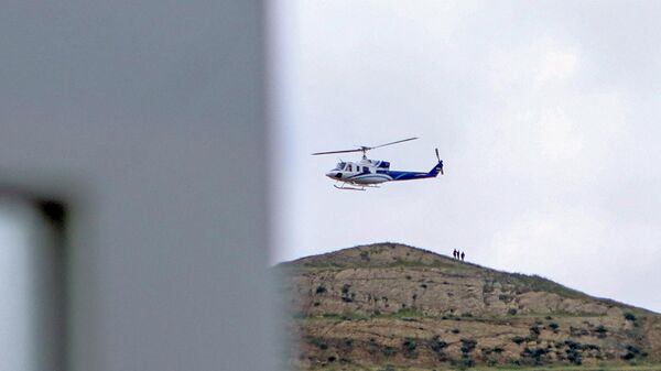 Вертолет с президентом Ирана Ибрагимом Раиси, взлетающий на иранской границе с Азербайджаном - Sputnik Беларусь