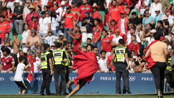 Футбольный матч Аргентина – Марокко на ОИ-2024 не доиграли из-за беспорядков - Sputnik Беларусь