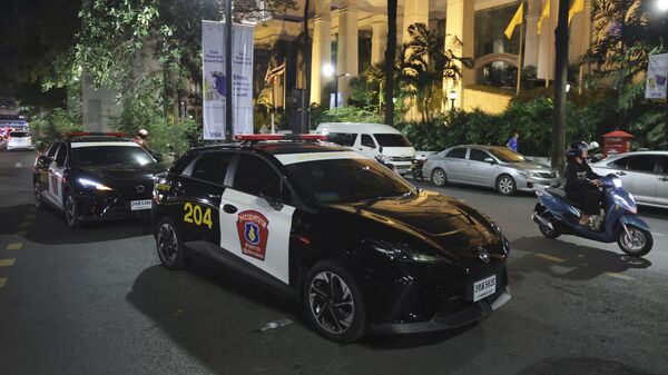 Полицейские машины возле отеля в Таиланде, архивное фото - Sputnik Беларусь