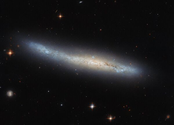Галактика NGC 4423, которая находится в 55 млн световых лет от Земли в созвездии Девы - Sputnik Беларусь