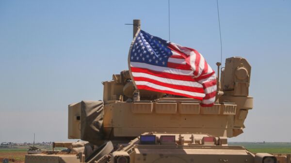 Американская бронемашина в Сирии, архивное фото Американская бронемашина в Сирии, архивное фото - Sputnik Беларусь