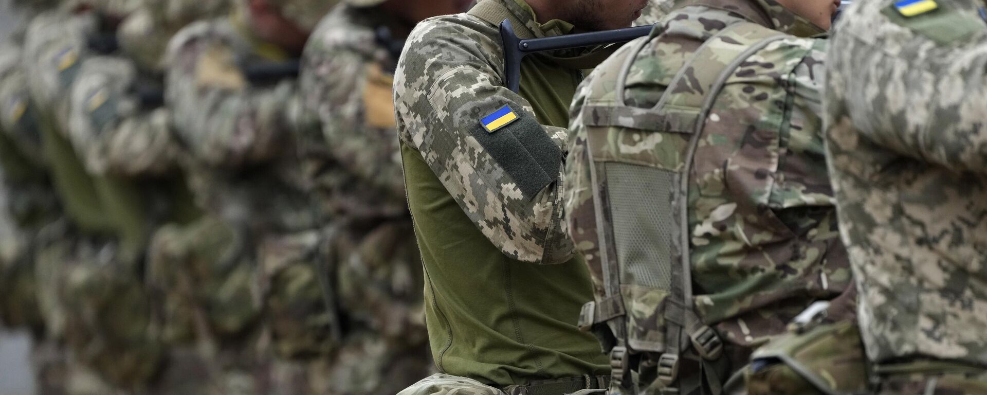Ваеннаслужачыя з украінскімі шаўронамі, архіўнае фота - Sputnik Беларусь, 1920, 11.07.2025