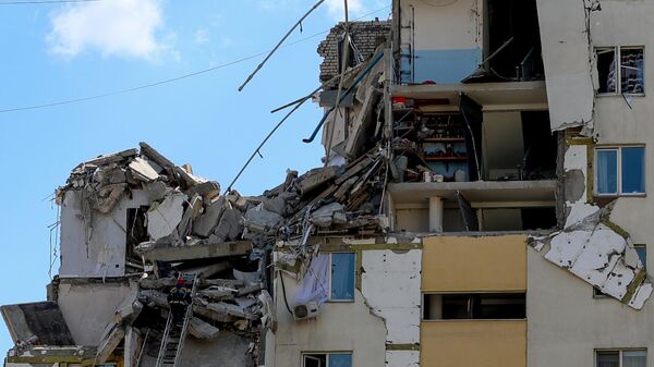 Последствия взрыва бытового газа в подъезде 10-этажного жилого дома в Саратове - Sputnik Беларусь