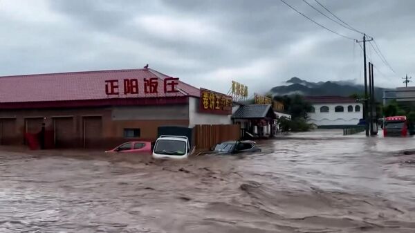 Самое мощное за 60 лет наводнение в Китае затопило Пекин и пригороды  - Sputnik Беларусь