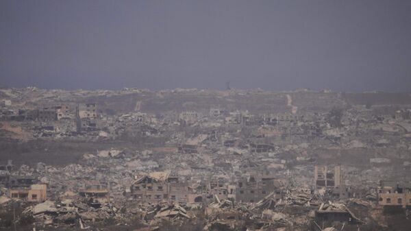 Поврежденные здания в секторе Газа, вид с юга Израиля - Sputnik Беларусь