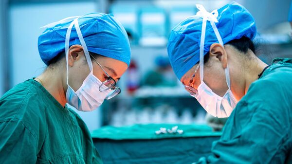 Китайские врачи - Sputnik Беларусь