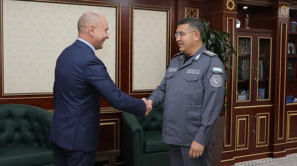 Геннадий Казакевич и Азиз Ташпулатов
 - Sputnik Беларусь