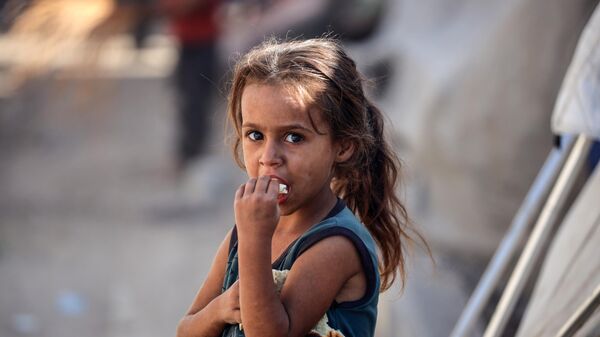 Ребенок в лагере беженцев, архивное фото - Sputnik Беларусь