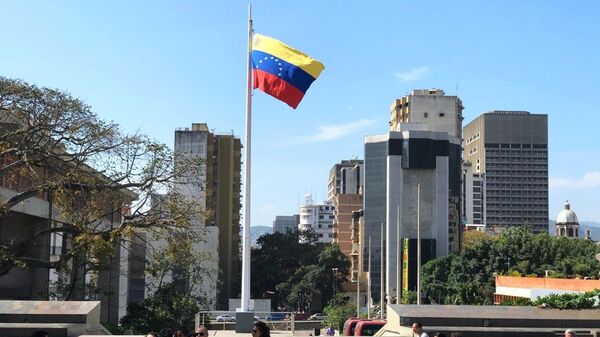 Прохожие на улице Каракаса - Sputnik Беларусь