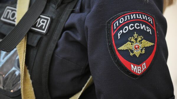 Шеврон на форме сотрудника полиции - Sputnik Беларусь