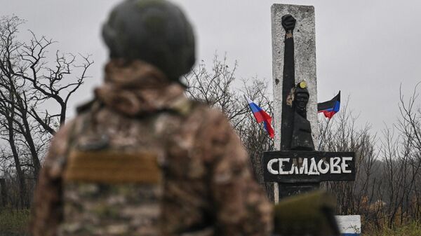 Ваеннаслужачы УС РФ на ўездзе ў горад Селідава ў ДНР Ваеннаслужачы УС РФ на ўездзе ў горад Селідава ў ДНР - Sputnik Беларусь