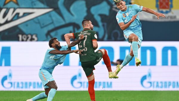 Жерсон (Зенит), Николай Комличенко (Локомотив) и Нуралы Алип (Зенит) в матче 14-го тура российской Премьер-лиги (РПЛ) в Санкт-Петербурге - Sputnik Беларусь
