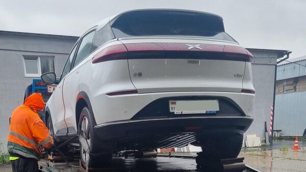 Электромобиль Xpeng героини материала - Sputnik Беларусь