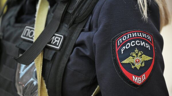 Шаўрон на форме супрацоўніка паліцыі РФ - Sputnik Беларусь