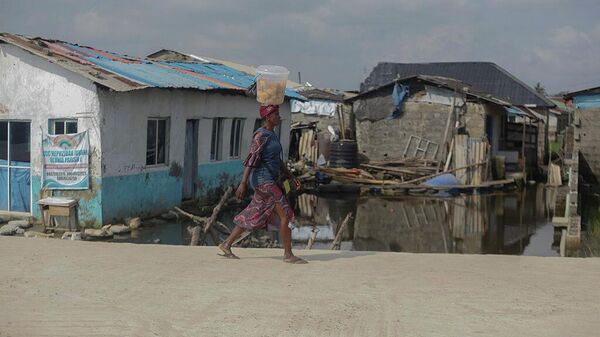 Местная жительница в Агбойи-Кету, Лагос, Нигерия. - Sputnik Беларусь