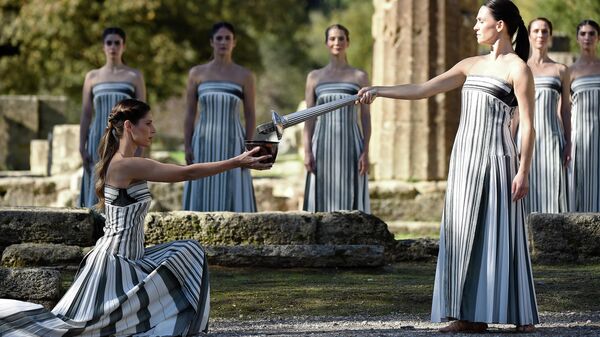 Зажжение олимпийского огня в Греции - Sputnik Беларусь