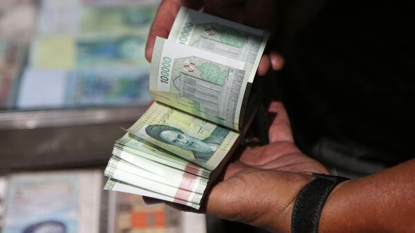Иранские риалы - Sputnik Беларусь