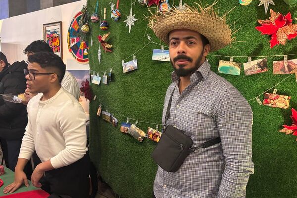 Стенд Венесуэлы на Рождественской благотворительной ярмарке в Минске Стенд Венесуэлы на Рождественской благотворительной ярмарке в Минске - Sputnik Беларусь