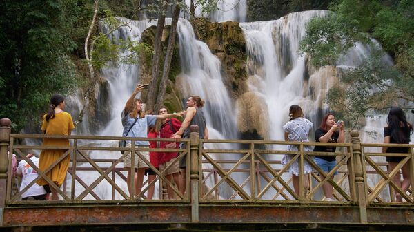 Туристы в Лаосе - Sputnik Беларусь
